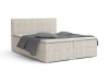 Beiges Boxspringbett in Cord-Optik mit grauer Bettwäsche