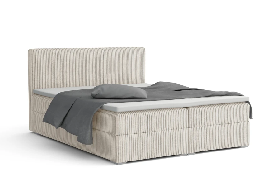 Beiges Boxspringbett in Cord-Optik mit grauer Bettwäsche