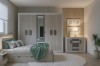 Modernes Schlafzimmer-Set mit großem Kleiderschrank, Bett und Kommode in hellem Holzdesign.