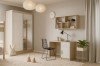 Modernes Kinderzimmer-Set mit Kleiderschrank, Schreibtisch und Wandregal in Eiche und Weiß.