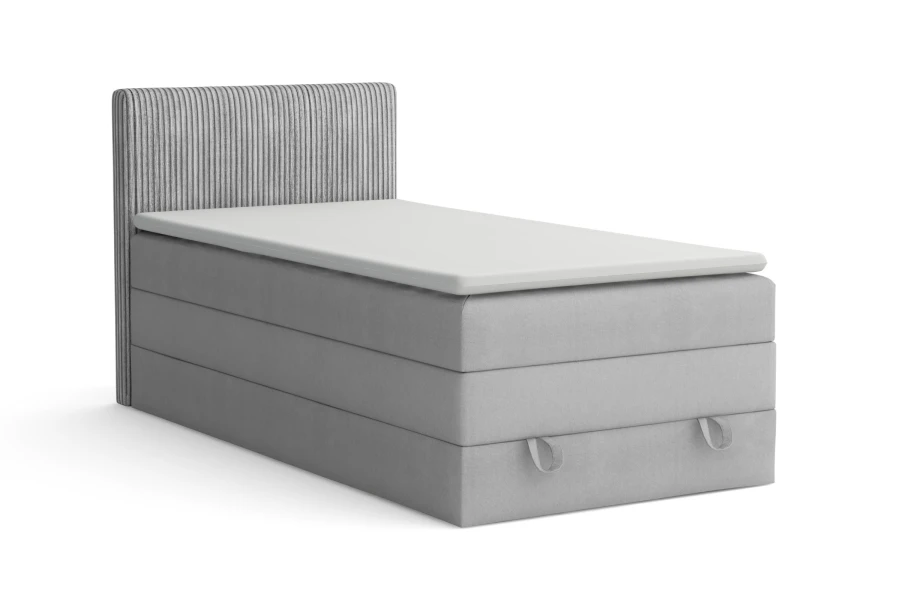 Hellgraues Boxspringbett Einzelbett mit Bettkasten und Topper auf weißem Hintergrund.