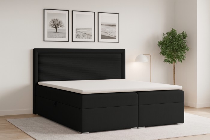Gezellige slaapkamer met het zwarte boxspringbed John II en decoratie