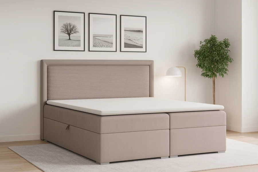 Modernes Boxspringbett in Beige mit geripptem Kopfteil und Bettkasten im Schlafzimmer.