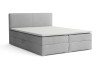 Graues Boxspringbett mit Polster-Kopfteil und weißem Topper
