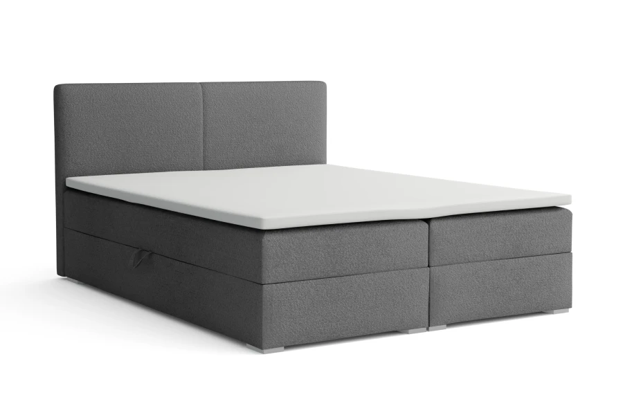 Modernes graues Boxspringbett mit Stauraum auf weißem Hintergrund.