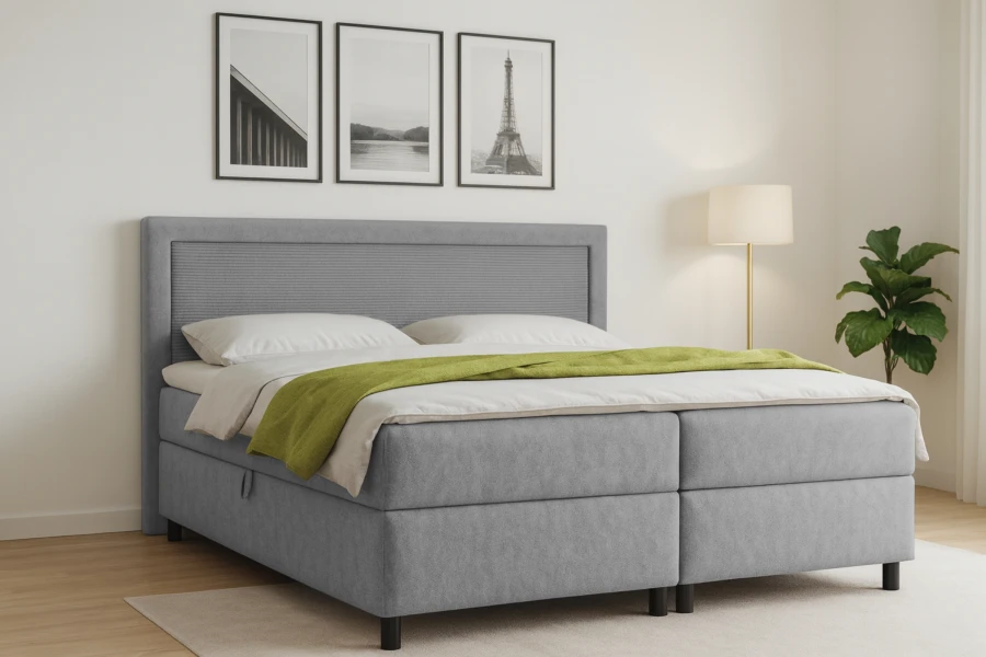 Boxspringbett John im eingerichteten Schlafzimmer mit Wandbildern