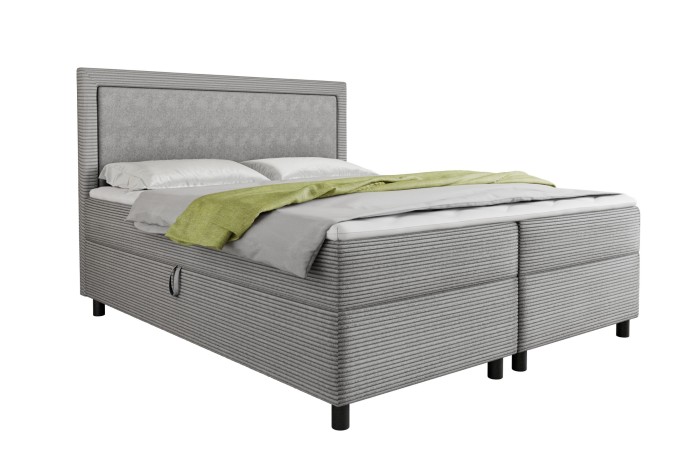 Modernes graues Boxspringbett mit Cord-Bezug Poso auf weißem Hintergrund.