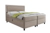 Beiges Boxspringbett Lars mit Cord-Optik, hohem Kopfteil und praktischem Stauraum.
