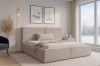 Gemütliches Schlafzimmer-Ambiente mit dem beige Polsterbett Berno aus Cord-Stoff.