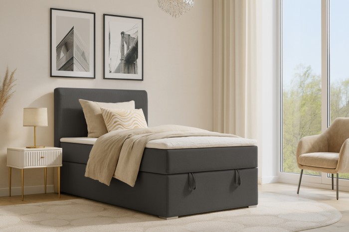 Antracietkleurig boxspringbed in modern ingerichte slaapkamer met hoofdbord.