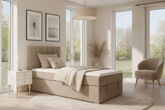 Bright bedroom set with beige David Mini boxspring bed, bedside table and cosy decoration.