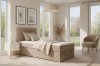 Modern beige box spring bed in a bright bedroom with window and decor.