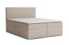 Beiges Boxspringbett KAI mit gepolstertem Kopfteil auf weißem Hintergrund präsentiert.