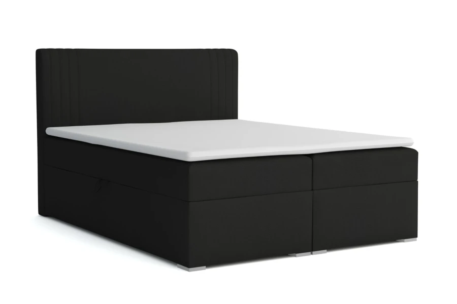 Schwarzes Boxspringbett mit gepolstertem Kopfteil auf weißem Hintergrund.