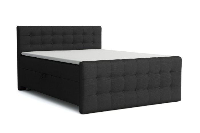 Dark grey box spring bed in anthracite with button tufting on the headboard and footboard.