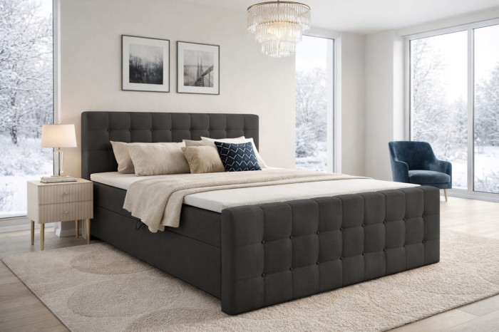Stijlvol boxspringbed in donkergrijs in een moderne slaapkamer met winteruitzicht.
