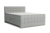 Boxspringbett Reel in Hellgrau mit abgestepptem Kopf- und Fußteil auf weißem Hintergrund.