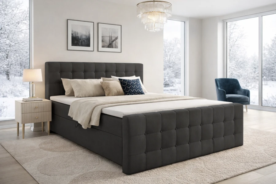 Modernes Boxspringbett in Anthrazit mit gestepptem Kopfteil in winterlichem Schlafzimmer.