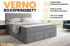 Grijs Verno boxspringbed met twee opbergbakken and 4 cm koudschuim-topper in een moderne slaapkamer.