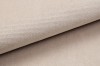 Nahaufnahme der feinen Webstruktur des beigen Polsterstoffs für hochwertige Boxspringbetten.
