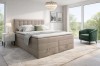 Beiges Boxspringbett mit Stauraum-Schubladen in modernem Schlafzimmer-Ambiente.