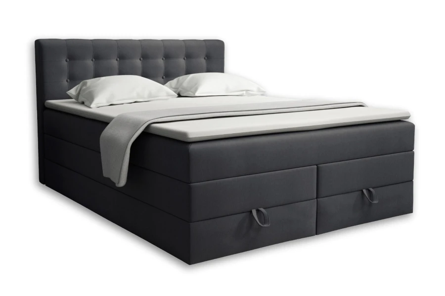 Dunkelgraues Boxspringbett mit praktischen Schubladen auf weißem Hintergrund.