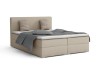 Beiges Boxspringbett mit grauem Bettzeug und gestreiften Kissen, isoliert auf weißem Hintergrund.