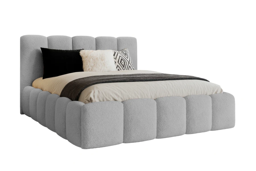 Graues Design-Polsterbett mit strukturiertem Rahmen und weichem Kopfteil, Seitenansicht.