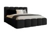Schwarzes Design-Bett mit segmentierter Polsterung, freigestellt auf Weiß.