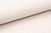 Nahaufnahme der hochwertigen, beigen Stofftextur des Boxspringbettes.
