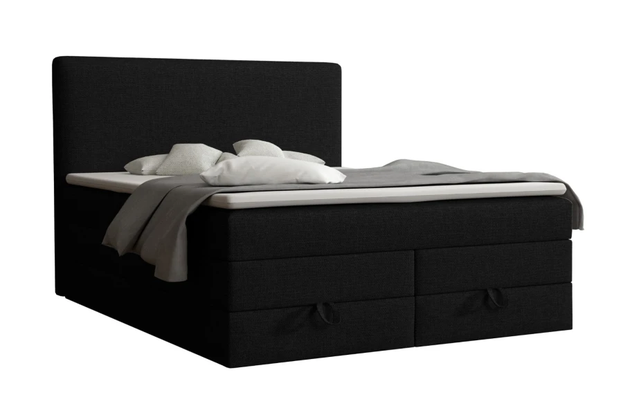 Schwarzes Boxspringbett mit Kopfteil und praktischen Bettkästen auf weißem Hintergrund.