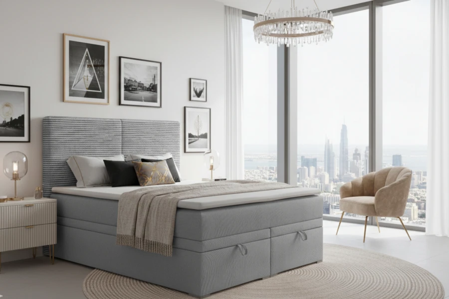 Boxspringbed Daniel in een moderne slaapkamer met luxueus uitzicht op de stad en een gezellige inrichting.
