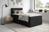 Modern black boxspring bed in bedroom with world map and lamps.