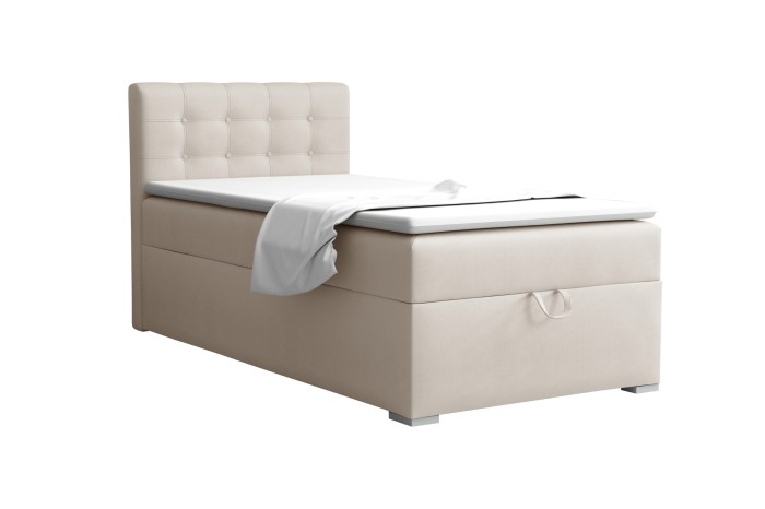 Beige box-spring single bed with quilted headboard and integrated bed base.