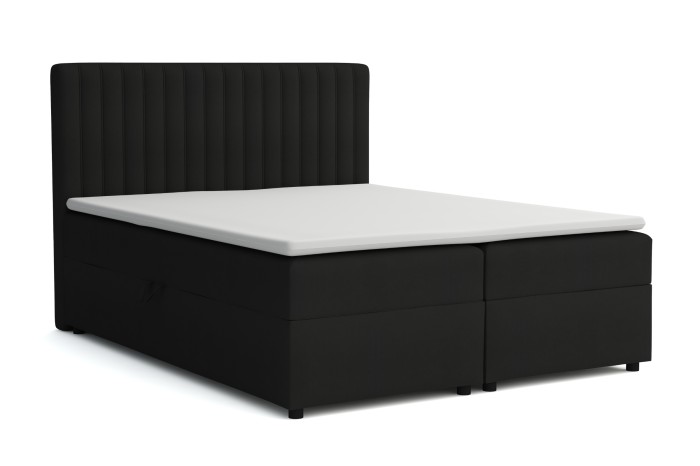 Zwart boxspringbed met gecapitonneerd hoofdbord