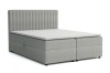 Lichtgrijs boxspringbed met hoog hoofdbord en verticale stiksels