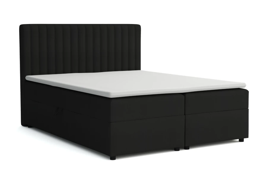 Modern zwart boxspringbed met hoog hoofdbord op een witte achtergrond.