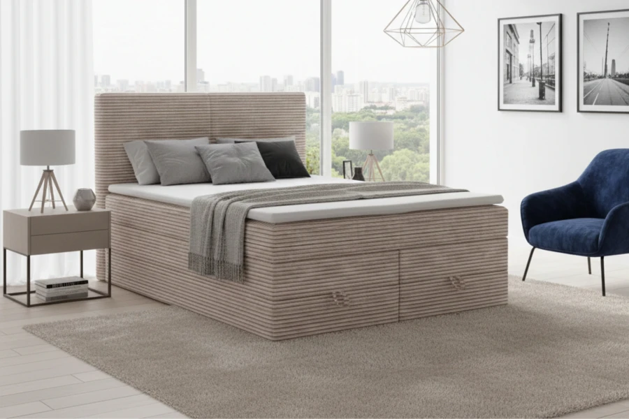 Modernes beiges Boxspringbett aus Cord im hellen Schlafzimmer mit Stadtblick.