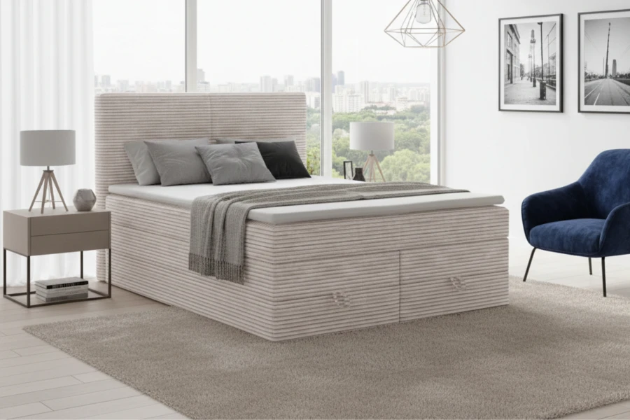 Beiges Boxspringbett mit Cord-Struktur, Bettkasten und modernem Design für das Schlafzimmer.