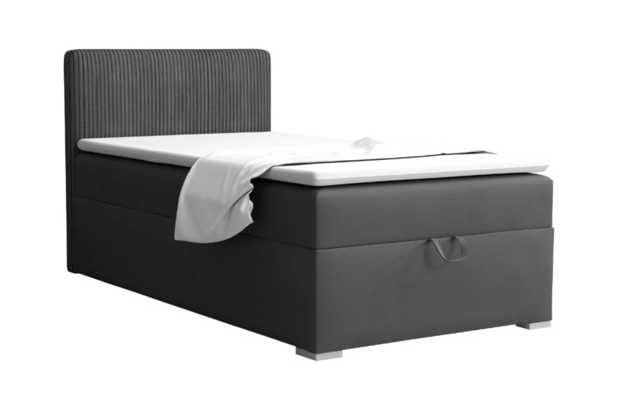 Elegant boxspringbed in antraciet met markant geribbeld hoofdbord.