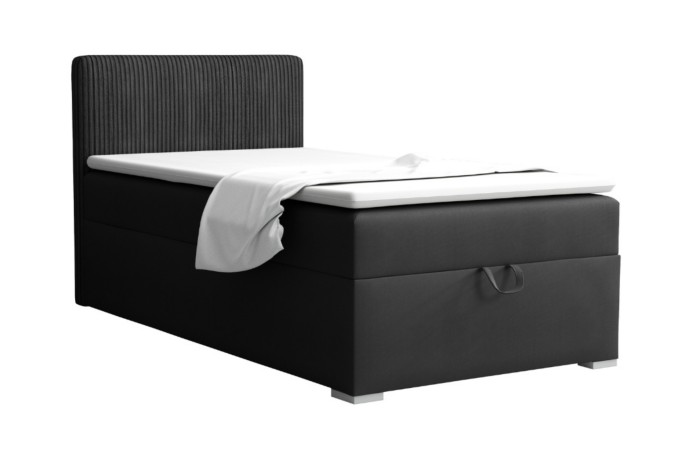 Zwart boxspringbed met geribbeld hoofdbord en praktische uittrekbare bedbak.