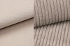 Close-up van beige ribstof en gladde meubelstof voor bedden.