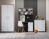 Stylish youth room with grey-white furniture in front of a striped wall, desk and wardrobe.