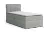 Graues Boxspringbett mit Cord-Kopfteil und weißem Topper, Einzelbett freigestellt.