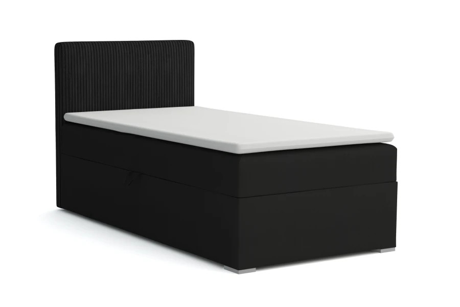 Schwarzes Boxspringbett mit hohem Cord-Kopfteil und weißem Topper vor weißem Hintergrund.