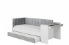 Funktionsbett mit Schreibtisch rechts, Betonoptik-Details und praktischer zweiter Liegefläche.