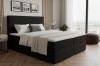 Luxuriöses schwarzes Boxspringbett aus Cordstoff im modernen Schlafzimmer-Design.