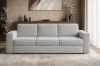 Hellgraues Bouclé-Sofa in einem stilvollen Wohnzimmer-Ambiente.