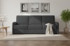Anthrazitfarbenes 3-Sitzer Sofa in gemütlichem Wohnzimmer-Ambiente.