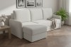 Modernes Ecksofa in Beige mit Ottomane links im hellen Wohnzimmer.